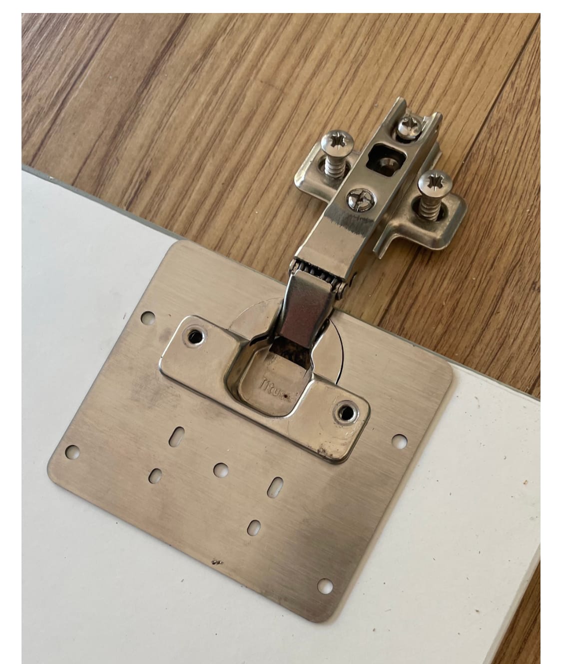 Hinge repair hack: a quick and cheap fix for a damaged cabinet door